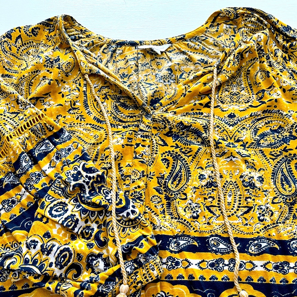 Lucky Brand long sleeve top. Detailed sleeve, with tassel neckline. Gorgeous!